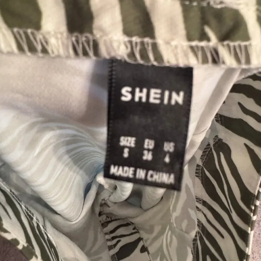 SHEIN Women's Zebra Print Flare Pants Green Size S Casual Stylish NWOT
